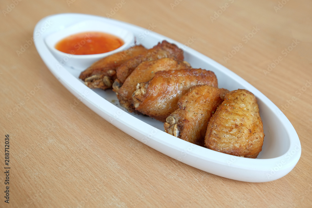 fried chicken with sauce on plate fried chicken with sauce on plate