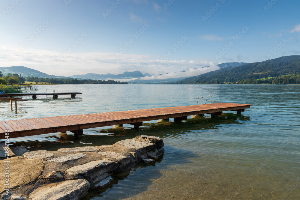 Panorama of a lake with a jetty, Irrsee, Austria