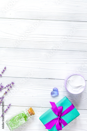 baby bath salt with lavender on wooden background