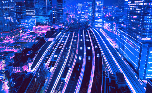 Photography Aerial view of a large train station in Tokyo, Japan synth wave style