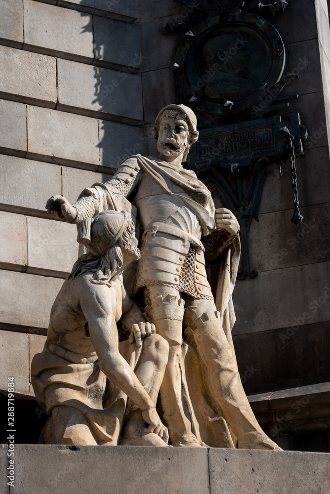 Obraz premium artistic monument in stone and bronze representing a statue