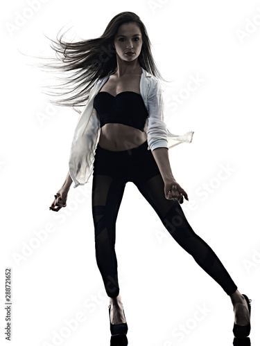 one young beautiful long hair caucasian woman modern ballet disco dancer dancing studio shot silhouette shadow isolated on white background