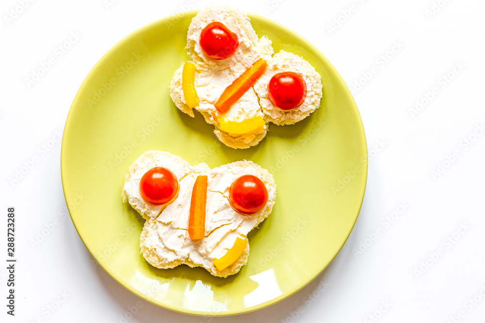 kid breakfast butterfly sandwiches top view on white background