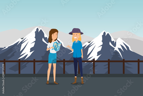 women tourist with global map in the snowy mountains
