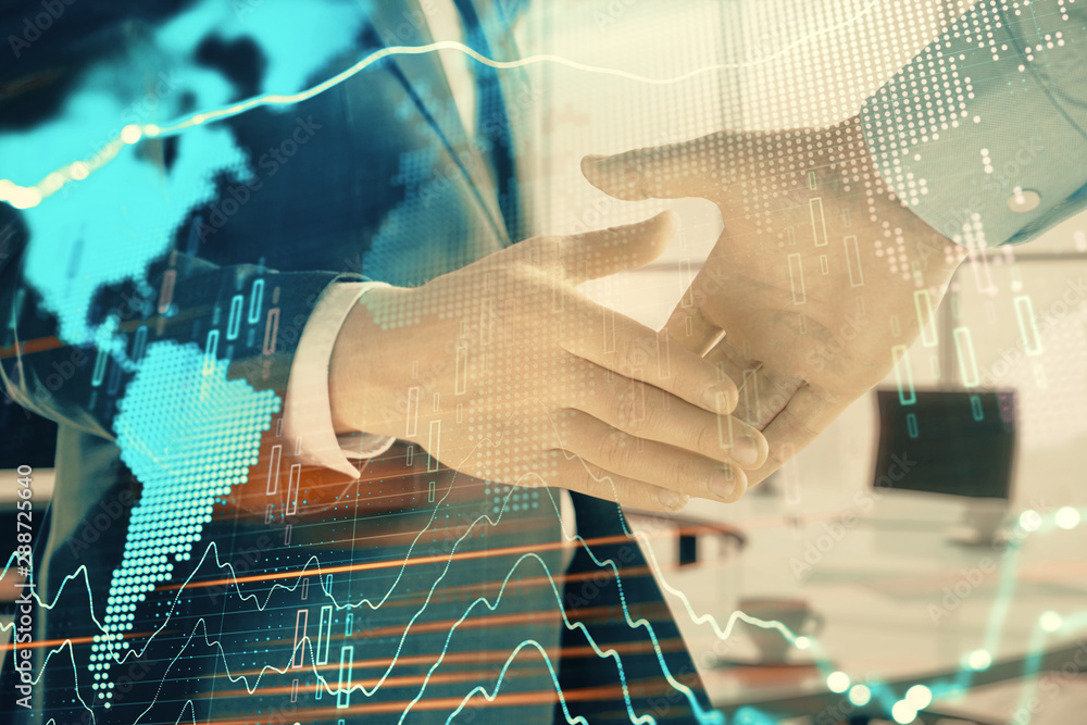 Multi exposure of financial chart and map on office background with two businessmen handshake. Concept of success in business Multi exposure of financial chart and map on office background with two businessmen handshake. Concept of success in business