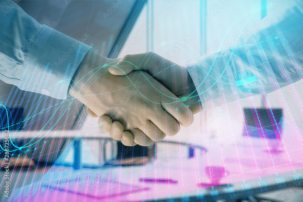Multi exposure of financial graph on office background with two businessmen handshake. Concept of success in business Multi exposure of financial graph on office background with two businessmen handshake. Concept of success in business
