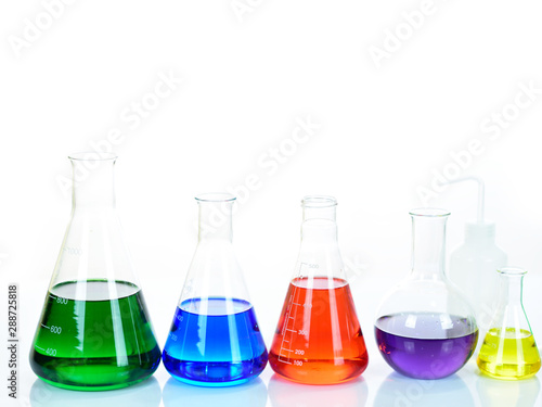 Laboratory glassware with colorful chemical reagent in research laboratory 