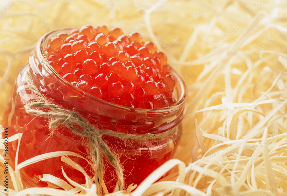 tasty and healthy red caviar in a glass jar tasty and healthy red caviar in a glass jar