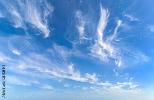 Blue sky with cirrus clouds. Image for backgrounds.