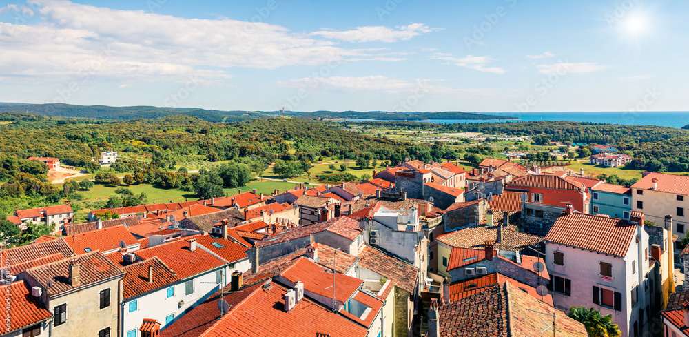 Aerial view of Vrsar (Orsera) town. Colorful spring cityscape of Croatia, Europe. Traveling concept background. Beautiful Mediterranean seascape.