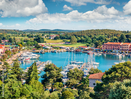 Fototapeta Naklejka Na Ścianę i Meble -  Aerial view of the port of Vrsar (Orsera) town. Colorful spring cityscape of Croatia, Europe. Traveling concept background. Magnificent Mediterranean seascape.