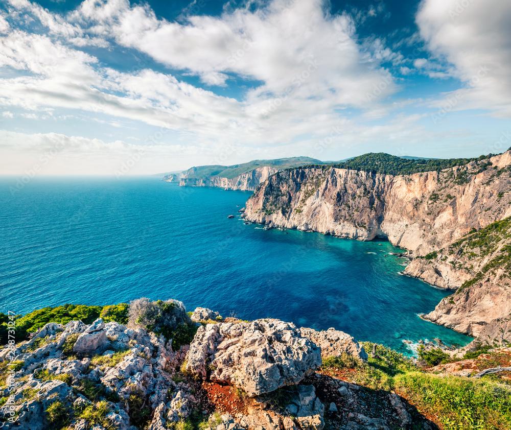 Fototapeta premium Gorgeous spring view of high cliffs on the Ionian Sea. Colorful morning seascape of Zakynthos (Zante) island, Greece, Europe. Beauty of nature concept background.