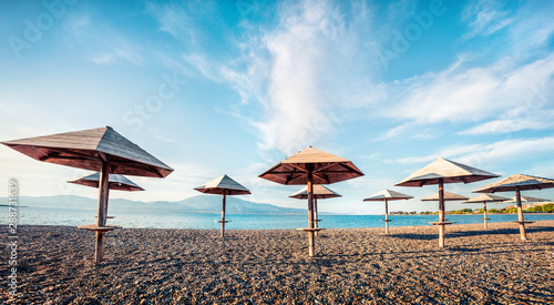First April warm days on the Nafpaktos beach. Sunny spring seascape of Corinth Gulf. Splendid morning scene of Greece resort. Vacation concept background.