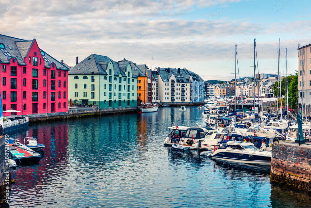 Splendid summer view of Alesund port town on the west coast of Norway, at the entrance to the Geirangerfjord. Colorful morning cityscape. Traveling concept background.