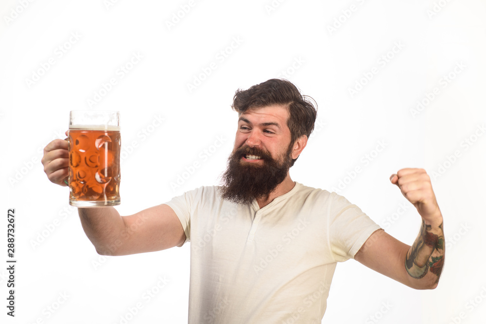 Brewer. Beer in Germany. Bearded man holds glass with delicious ale. Brewery concept. Craft beer at restaurant. Oktoberfest. Man tasting draft beer. Bearded man drinking ale. Barman. Beer pub and bar. Brewer. Beer in Germany. Bearded man holds glass with delicious ale. Brewery concept. Craft beer at restaurant. Oktoberfest. Man tasting draft beer. Bearded man drinking ale. Barman. Beer pub and bar.