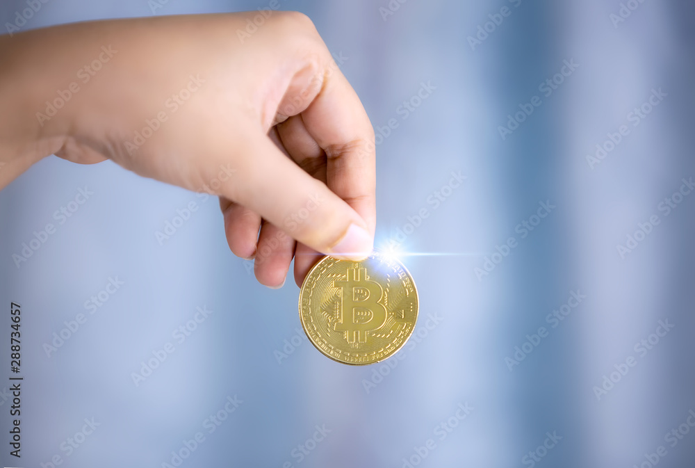 Fototapeta premium Bitcoins in hand