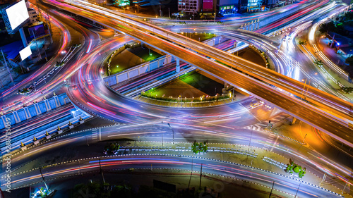 Photography Aerial view Expressway motorway highway circus intersection at Night time Top view , Road traffic in city at thailand