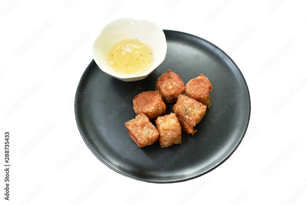 deep fried crab roll dumpling dipping sweet sauce on dish deep fried crab roll dumpling dipping sweet sauce on dish