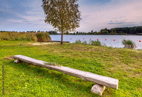 Public resting and swimming area on a riverside beach, Europe