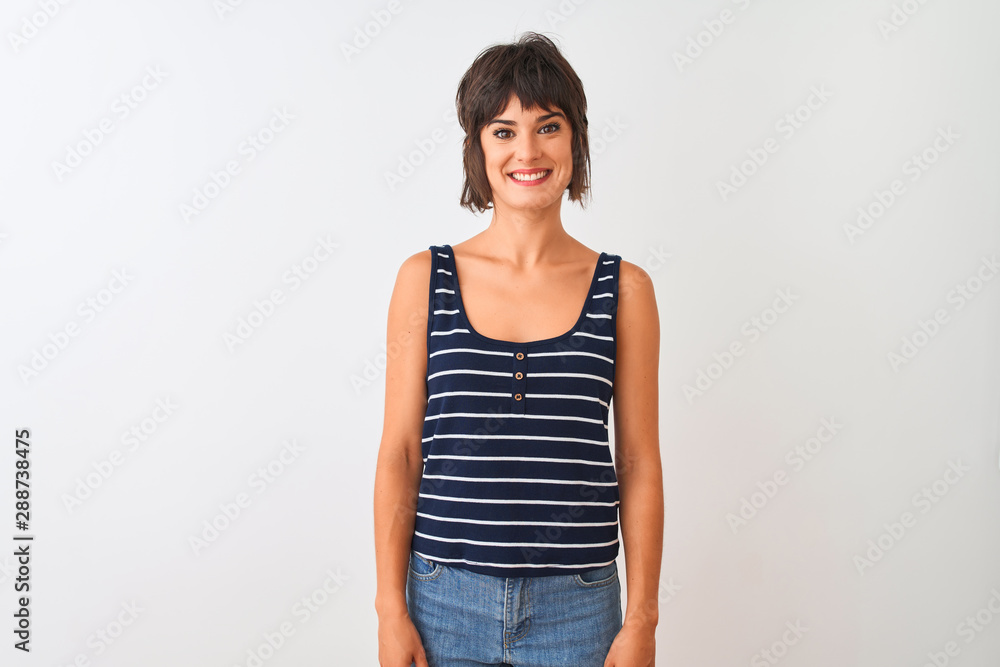 Young beautiful woman wearing striped t-shirt standing over isolated white background with a happy and cool smile on face. Lucky person. Young beautiful woman wearing striped t-shirt standing over isolated white background with a happy and cool smile on face. Lucky person.