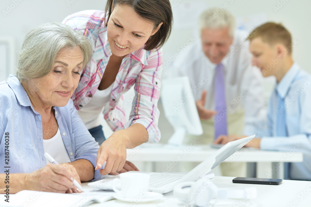Fototapeta premium Portrait of group of successful business people working