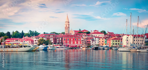 Colorful evening cityscape of old fishing town Isola. Fantastic spring seascape of Adriatic Sea. Beautiful evening panorama of Slovenia, Europe. Traveling concept background. Orton Effect.