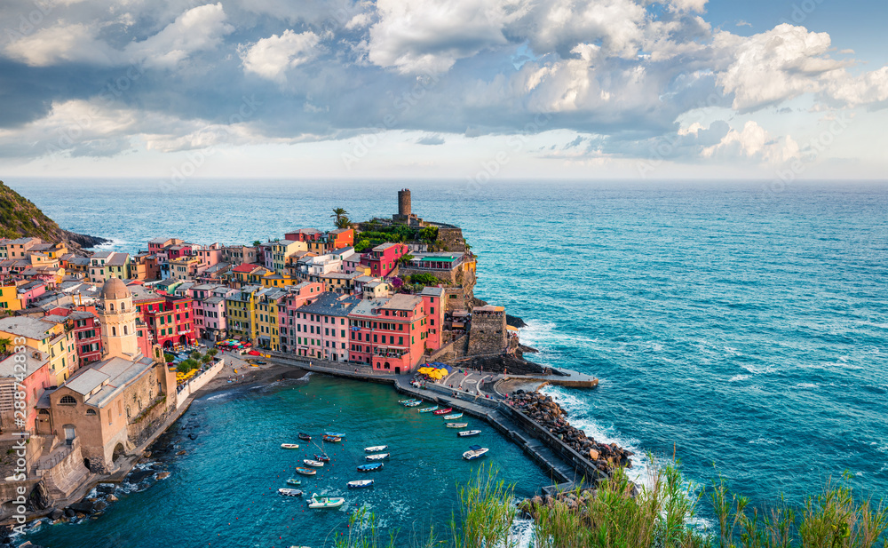 One of the five towns that make up the Cinque Terre region - Vernazza. Aerial spring view of Liguria, Italy, Europe. Splendid seascape of Mediterranean sea. Traveling concept background.