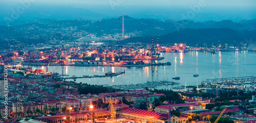 Aerial spring view of port and city of La Spezia. Colorful sunrise of Mediterranean sea, Liguria, Italy, Europe. Magnificent Mediterranean landscape. Traveling concept background.