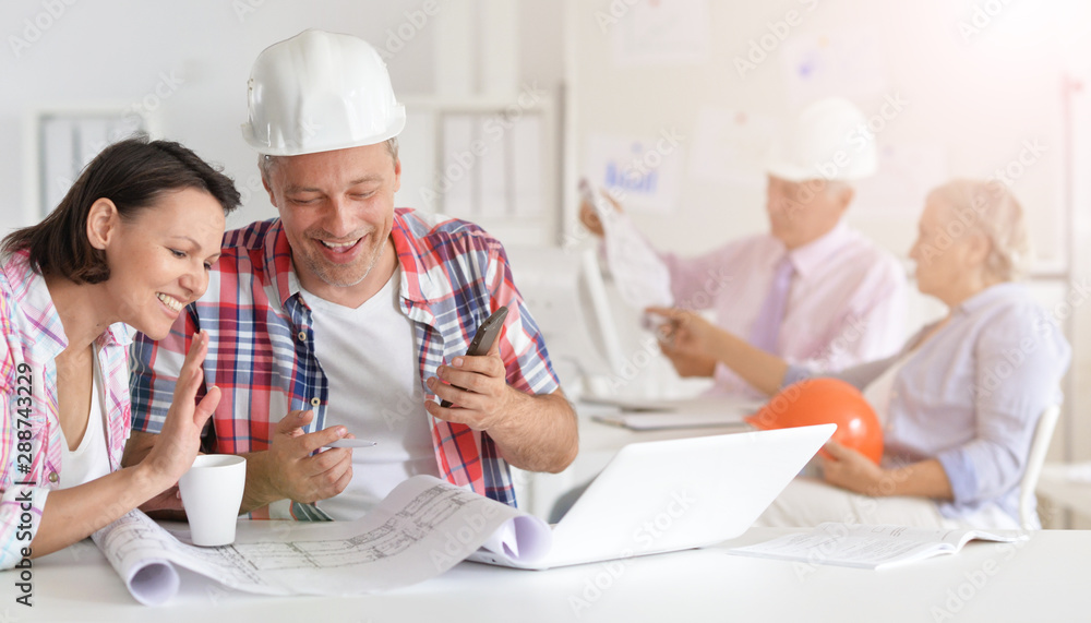Portrait of group of business people, architects working Portrait of group of business people, architects working