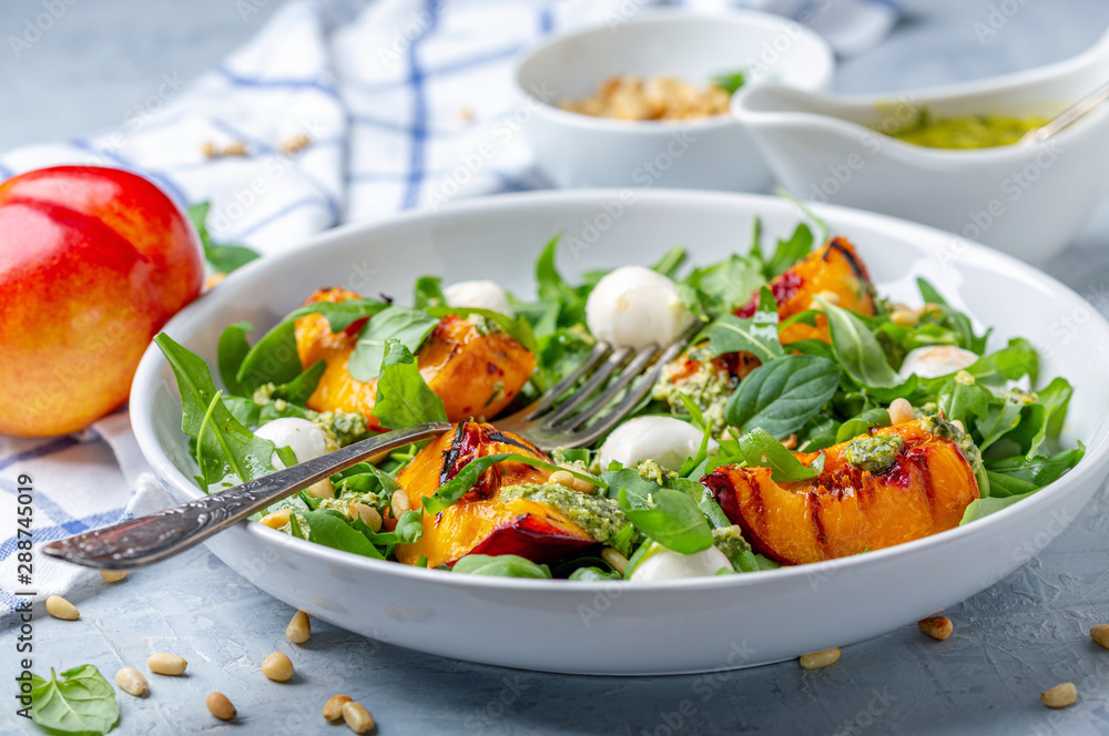 Arugula salad with grilled nectarines. Arugula salad with grilled nectarines.