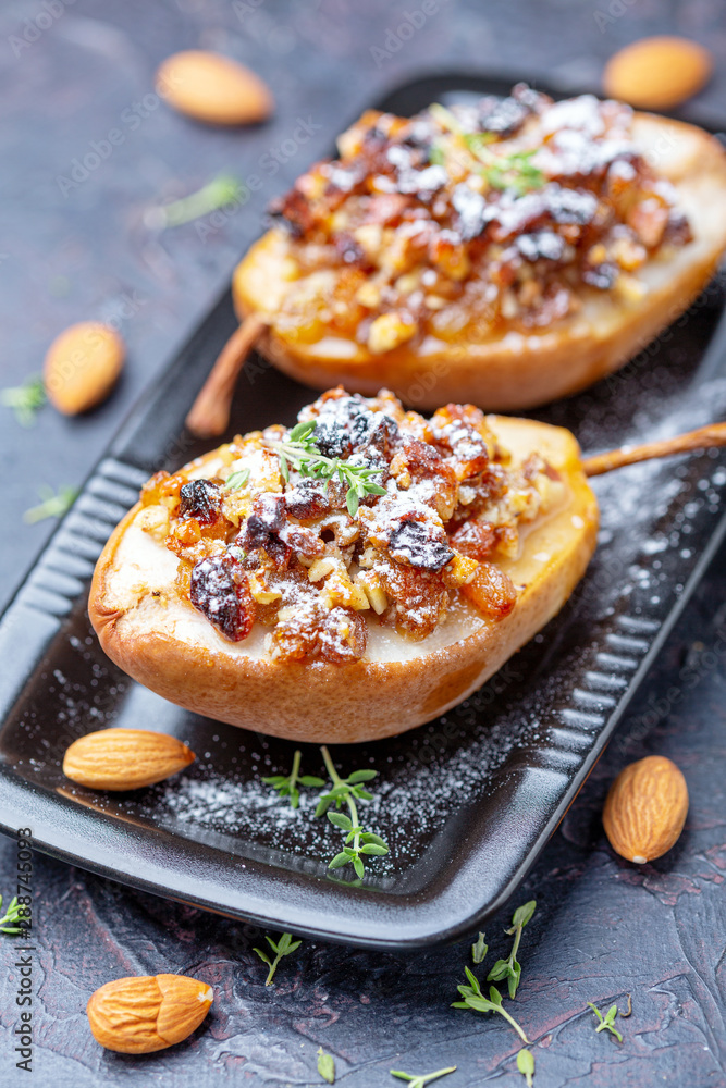 Pears baked in honey with raisins and nuts.