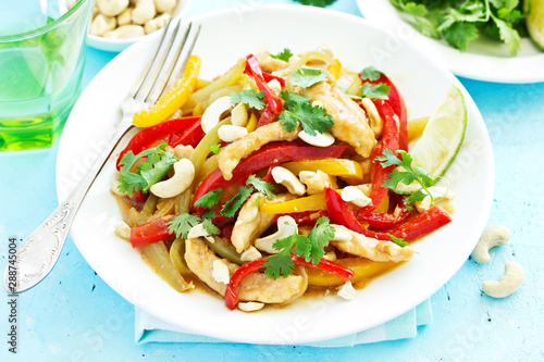 Chicken with vegetables in sweet and sour sauce.