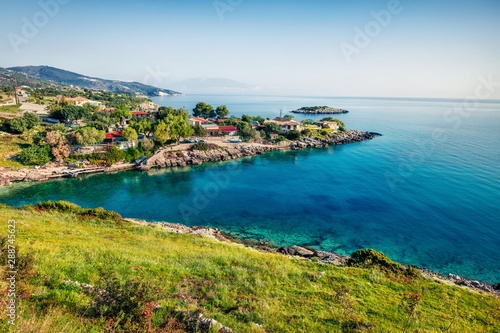 Small bay on the Zakynthos island. Sunny spring seascape of the Ionian Sea, Mikro Nisi village location, Greece, Europe. Traveling concept background. Instagram filter toned.
