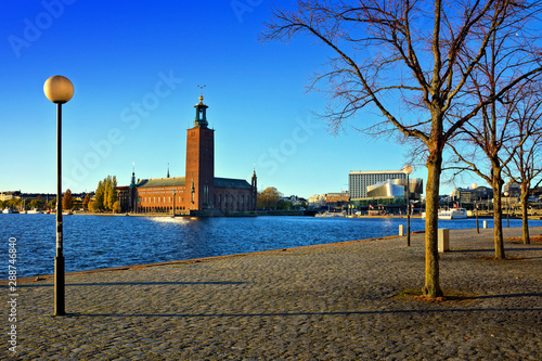 Stockholm, Sweden, view of City Hall from Evert Taubes Terrass, under late day autumn light photo