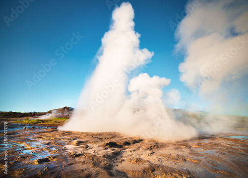 Erupting of the Great Geysir lies in Haukadalur valley