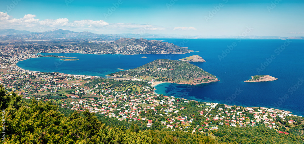 Aerial view of Porto Rafti town. Colorful spring seascape of Aegean sea. Sunny morning panorama of the Greece, Europe. Beauty of nature concept background.