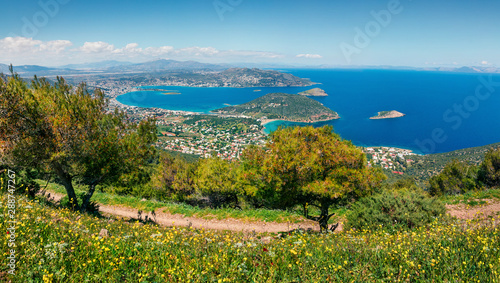 Aerial view of Porto Rafti town. Colorful spring seascape of Aegean sea. Sunny morning panorama of the Greece  Europe. Beauty of nature concept background.