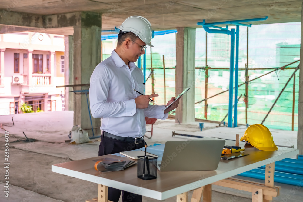 Civil engineer is inspecting in building site