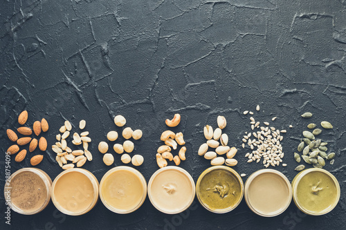 Nuts and seeds butter in glass jars