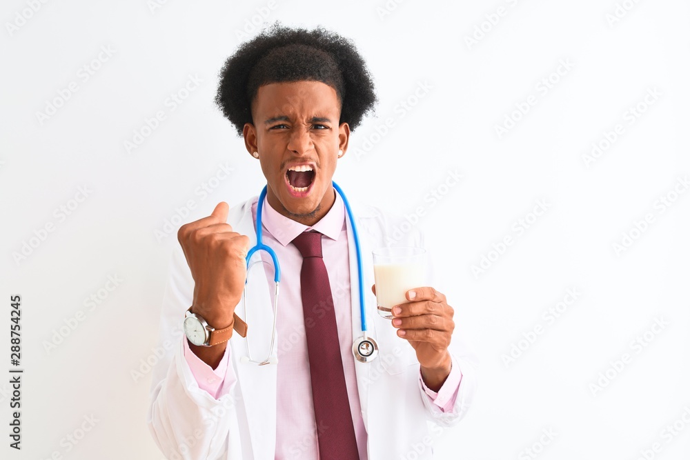 Young african american doctor man drinking glass of milk over isolated white background annoyed and frustrated shouting with anger, crazy and yelling with raised hand, anger concept Young african american doctor man drinking glass of milk over isolated white background annoyed and frustrated shouting with anger, crazy and yelling with raised hand, anger concept