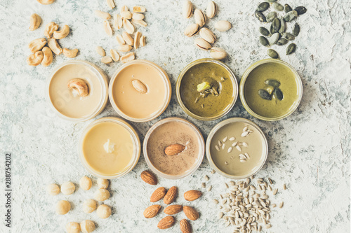 Nuts and seeds butter in glass jars
