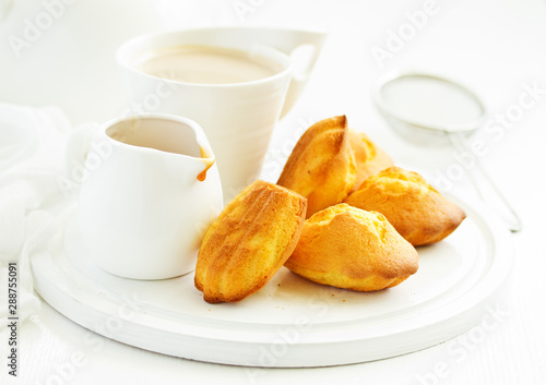 Madeleine french cookies with caramel. selective focus.