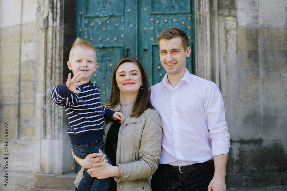 Mom, dad and little son. The concept of a happy family, motherhood and parenthood. Mom, dad and little son. The concept of a happy family, motherhood and parenthood.