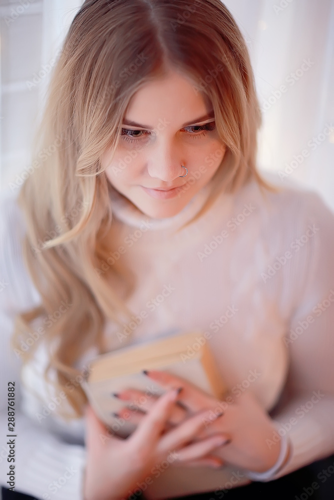 winter blonde / young adult model, blonde with long beautiful hair posing in the winter season winter blonde / young adult model, blonde with long beautiful hair posing in the winter season