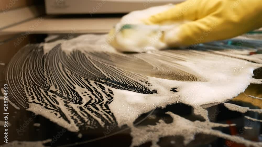 Plate hob cleaning. Sponge with detergent wash the hob of the electric