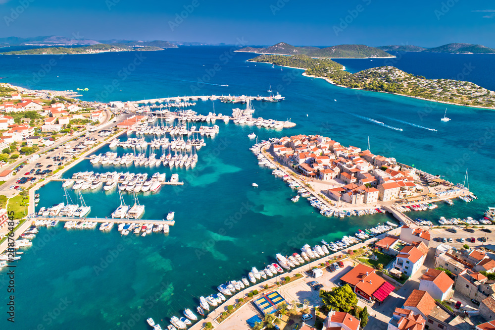 Dalmatian town of Tribunj and amazing turquoise archipelago aerial view