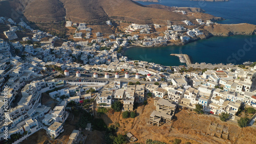 Aerial drone photo of iconic picturesque windmills overlooking the deep blue Aegean sea in Chora of Astypalaia island, Dodecanese islands, Greece photo