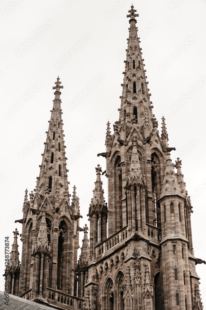 Rear view of spires towers of beautiful Sint-Petrus-en-Pauluskerk the main church of Ostend, Belgium, is a Roman Catholic Neo-Gothic church