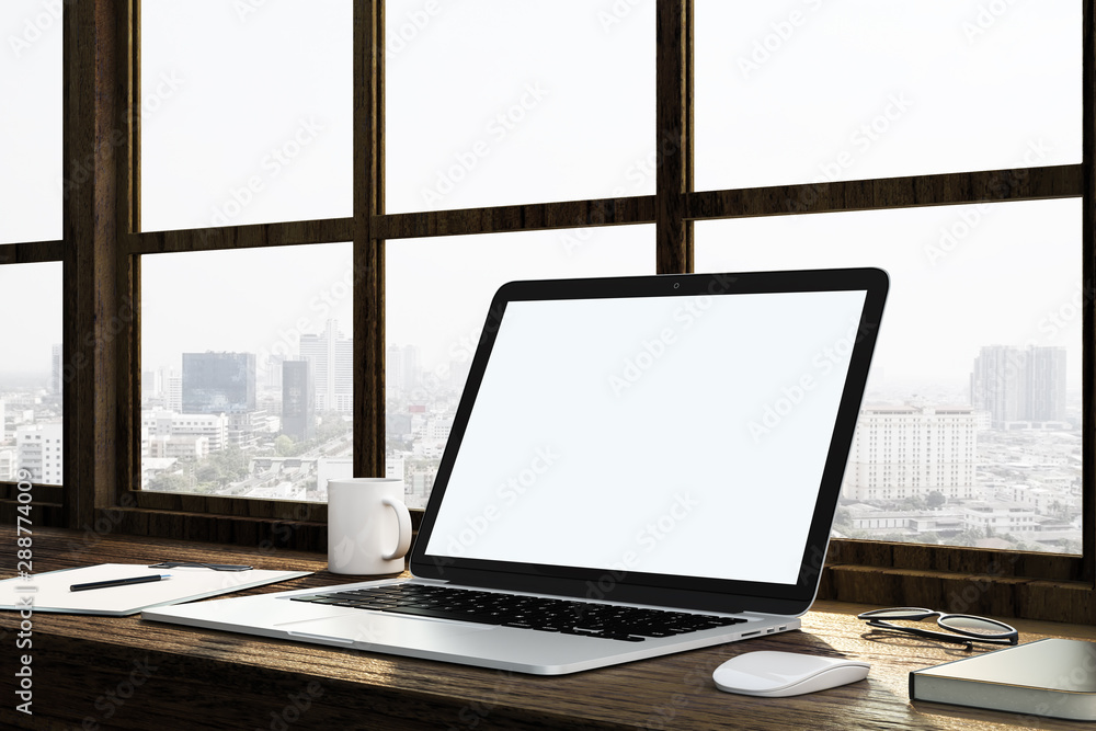 Blank white mock up laptop screen on wooden table in light space with megapolis view. Blank white mock up laptop screen on wooden table in light space with megapolis view.