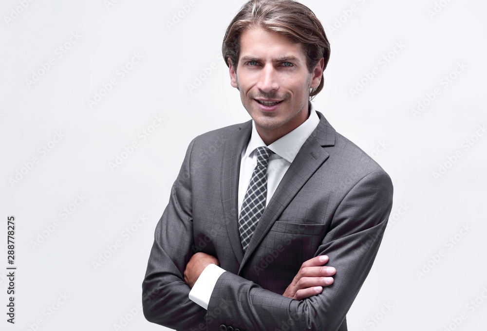 thoughtful businessman adjusting his tie. thoughtful businessman adjusting his tie.